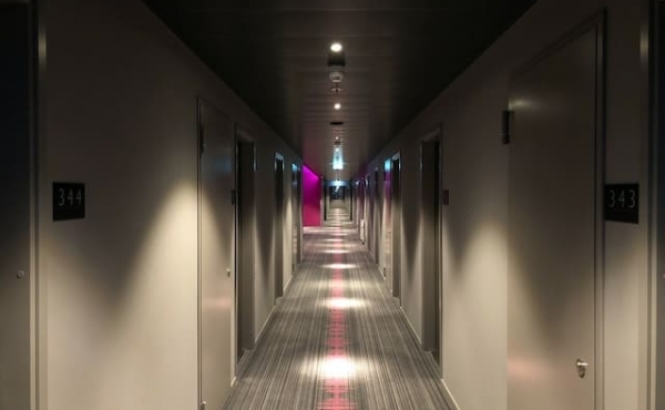 Remote lighting control systems in hotels and accommodation facilities